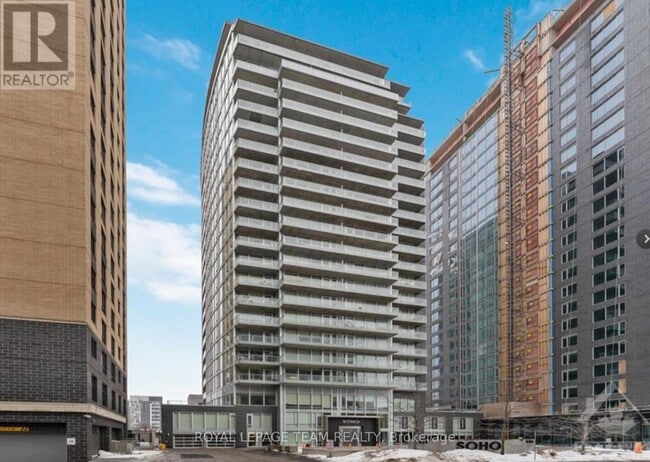 Building Photo - 111-1111 Champagne Ave S