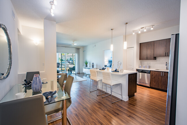 Kitchen and dining area with hard surface flooring - Avalon Miramar