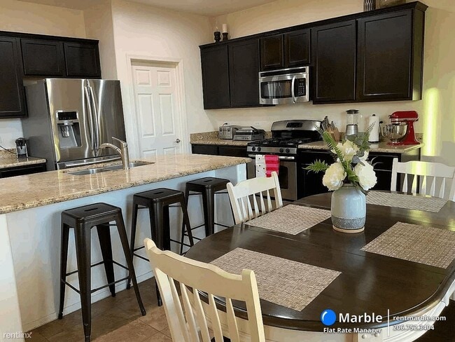 Building Photo - 4 br, 2.5 bath House - 476 E Channel View Pl