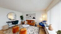 Located at 3454 Ruffin Rd in San Diego, CA, this 2-bedroom, 1-bathroom single-floor residence offers a well-organized and efficiently designed layout. The living room serves as the heart of the home, featuring warm light wood flooring, a large window with vertical blinds that invite generous natural light, and clean white walls that lend a bright, airy ambiance throughout. The kitchen is thoughtfully appointed with white shaker-style cabinetry, light quartz countertops, and black appliances including a refrigerator, electric range, over-the-range microwave, and dishwasher — all complemented by a window above the sink and light wood-style flooring. Both bedrooms are carpeted and offer a comfortable, quiet retreat. The primary bedroom features a spacious sliding-door closet, while the second bedroom includes a wall-mounted HVAC unit and a window for natural light. Each room is finished with textured ceilings. The shared full bathroom includes a shower/tub combination with a clean, minimalist design. Throughout the residence, the consistent use of white walls and light finishes creates a cohesive, modern aesthetic well-suited for comfortable everyday living in San Diego.