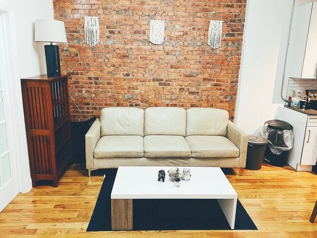 Photo - Central AC, washer/dryer, Exposed Brick Room #214 Apartment