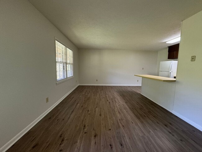 Building Photo - East Edge Apartments – Cozy, Wooded Community