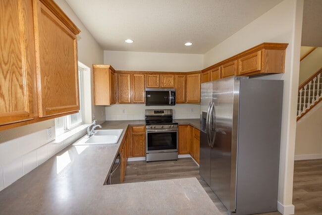Building Photo - Three bedroom home in Orchards. - JUST UPDATED