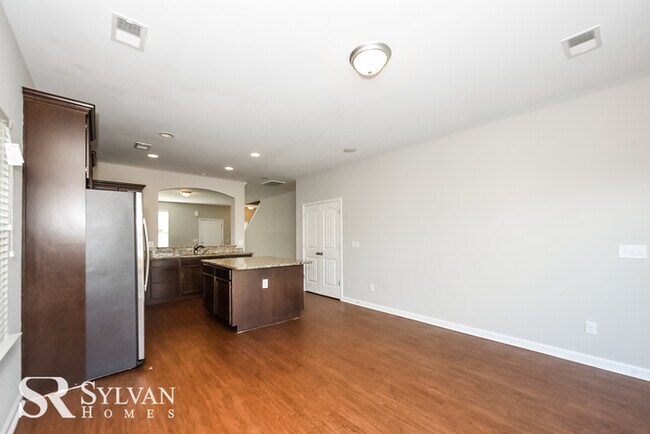 Building Photo - Fall in love with this spacious 4BR, 2.5BA...