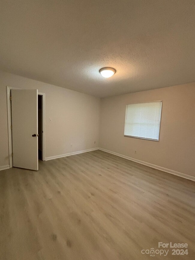 Building Photo - 7988 Shady Oak Trail