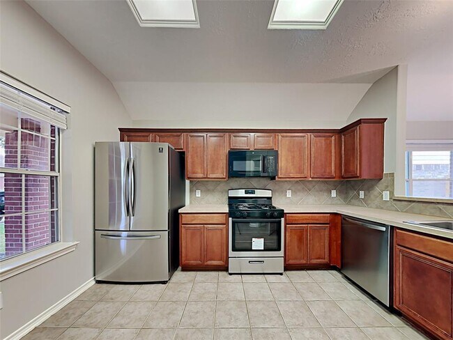 Foto del edificio - 6915 Pheasant Oak Dr
