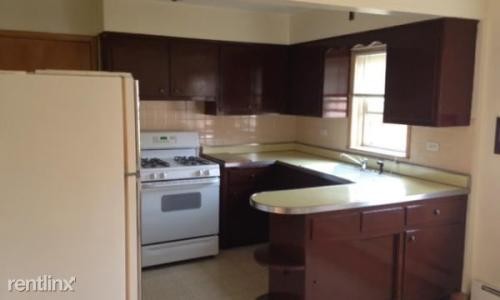 Building Photo - 6510 W Devon Ave