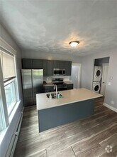 Building Photo - 610 River Ave