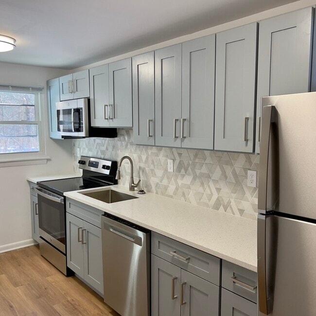 Building Photo - The Den Hunting Lodge (student)