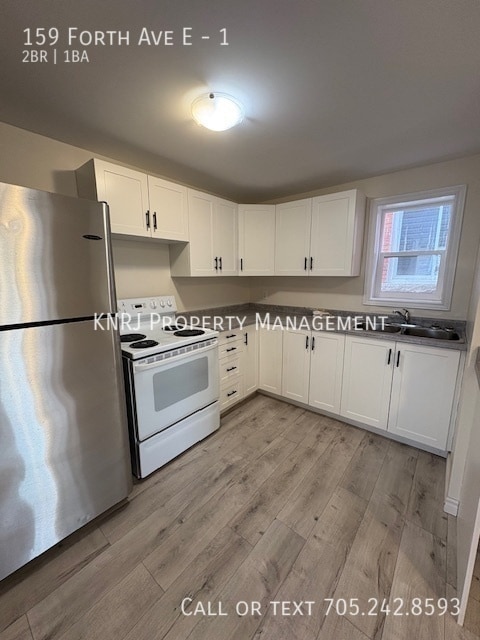 Building Photo - Two Bedroom Main Floor Apartment