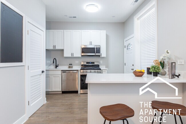 Foto del edificio - 3836 N Wilton Ave