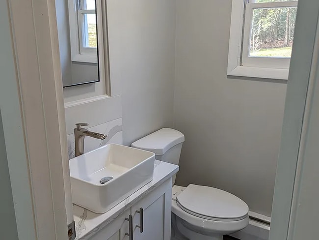 Building Photo - this contemporary & brightly remodeled 2,400 sqft home