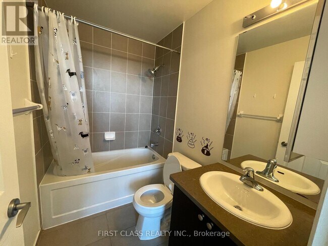 Photo du bâtiment - 339-1339 Rathburn Rd W