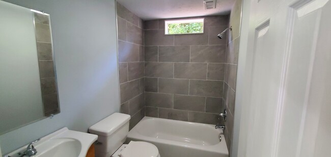 Newly Renovated Bathroom - 309 E 7th St