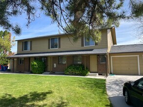 Building Photo - 7085-7085 W Amity Rd
