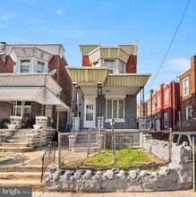 Building Photo - 5011 Larchwood Ave