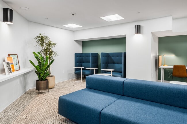 Create, collaborate, and connect in thoughtfully designed coworking areas - Newport Rentals