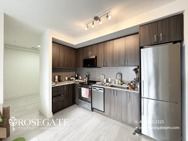 Building Photo - Modern 2-Bedroom + Den Condo with Balcony,...