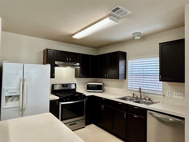 Foto del edificio - 10623 Sugar Trace Dr