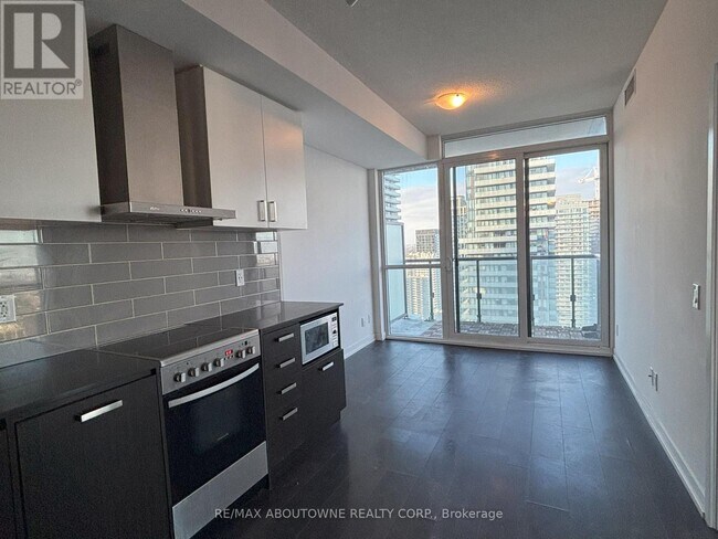 Photo du bâtiment - 125-3125 Redpath Ave