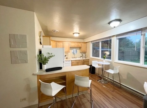 *Note* Flooring or coloring may vary slightly as the photo is of an identical downstairs unit. - 2176 W 15th Ct