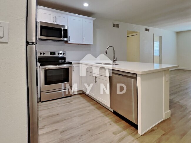 Building Photo - 1849 E Virginia Ave Unit 4