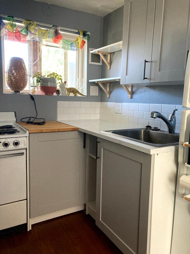 Kitchen is petite but recently renovated to maximize storage - 2327 46th Ave SW