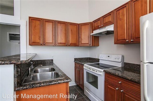 Building Photo - 1 br, 1 bath Apartment - 1217 - 1219 Magaz...