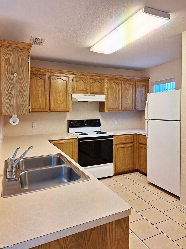 Foto del edificio - 2 br, 1.5 bath 4plex - 1905 Maria Isabel Dr A