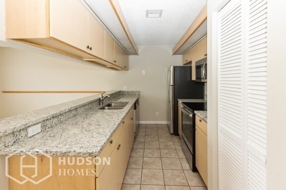 Building Photo - 6263 Riverwalk Ln