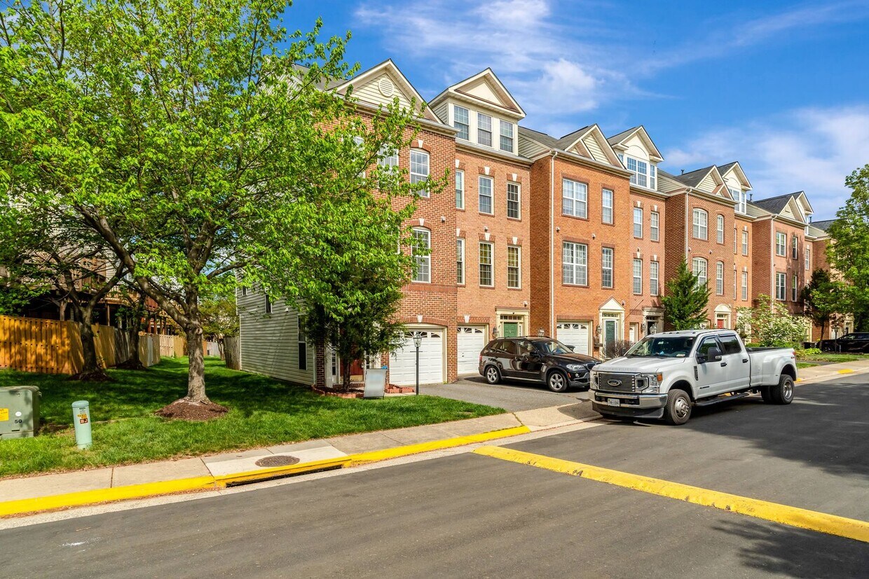 Primary Photo - Beautiful End Unit Townhome, close to Rest...