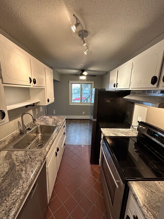 Stainless Appliances in Galley Kitchen - 4371 Wilshire Blvd
