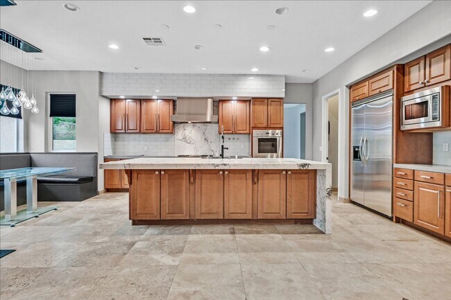 Building Photo - Fully Upgraded 5 Bedroom 4.5 Bathroom in Guard Gated Foothills Community!