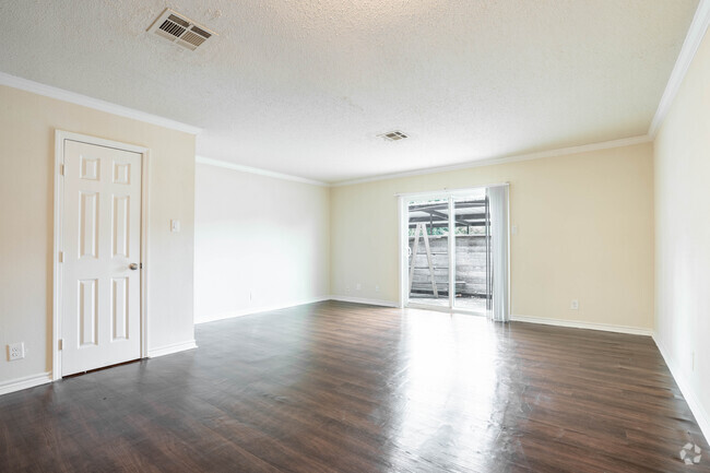 2BR, 1.5BA - Living Room - Camelot Apartments