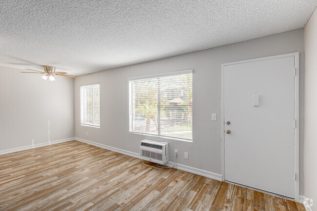 2BR, 1BA - 900SF - Living Room - The Courtyards