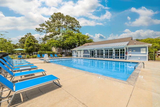 Pool Area at Village Green Apartments in Wilmington, NC - Village Green Apartment Homes