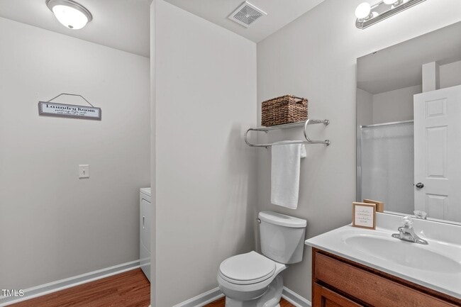 1st floor full bath with laundry - 228 Dove Cottage Ln