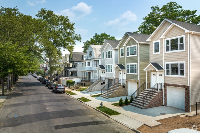 A row of newly completed town homes in East Orange, NJ ready for families.
