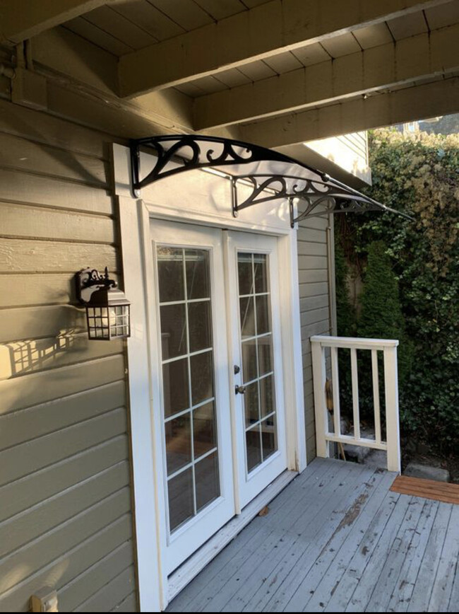 Exterior-French doors lead to covered deck - 1907 8th Ave W