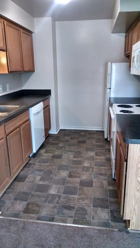 Fully Equipped Galley Style Kitchen - 36663 Woodward Ave