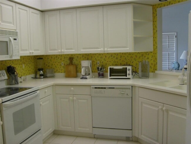 Foto del edificio - 6566 Fairway Gardens Dr
