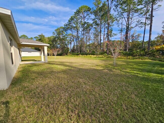 Foto del edificio - ******BEAUTIFUL 3/2 HOME IN PALM COAST***