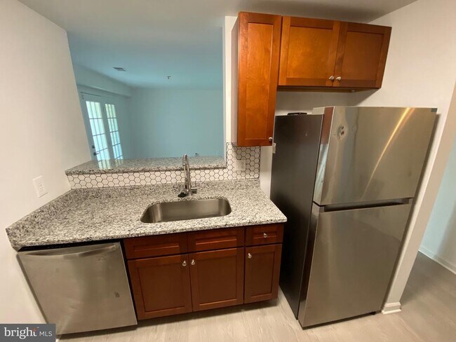 Building Photo - 7516 Snowpea Ct