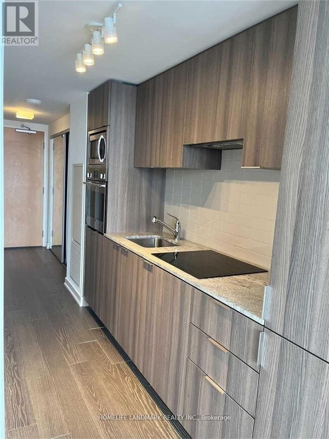 Building Photo - 11 Wellesley St W