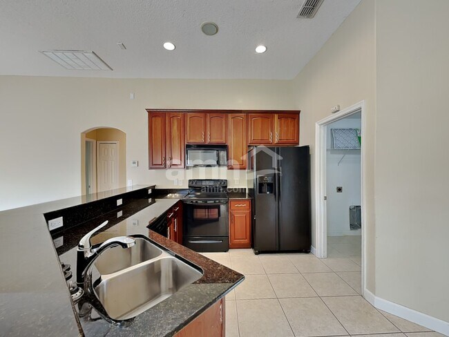 Building Photo - 5940 NW Foust Cir