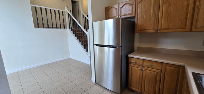 Building Photo - Charming Tri-Level 4-Bedroom on Corner Lot just steps to Waneka Lake & Coal Creek Trail