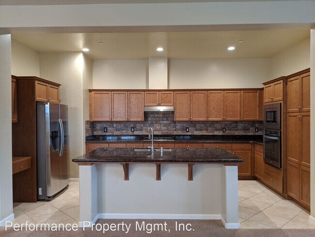 Building Photo - 4 br, 3 bath House - 7664 E. Giavanna Ave