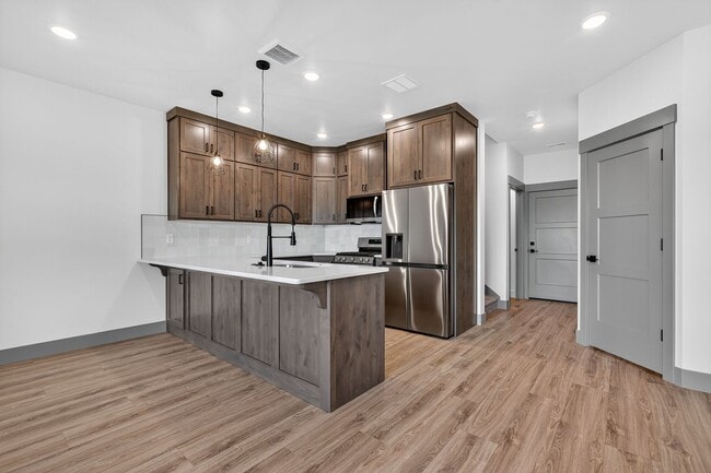 Building Photo - MUST SEE TOWNHOMES IN AMMON RIGHT OFF BEAC...