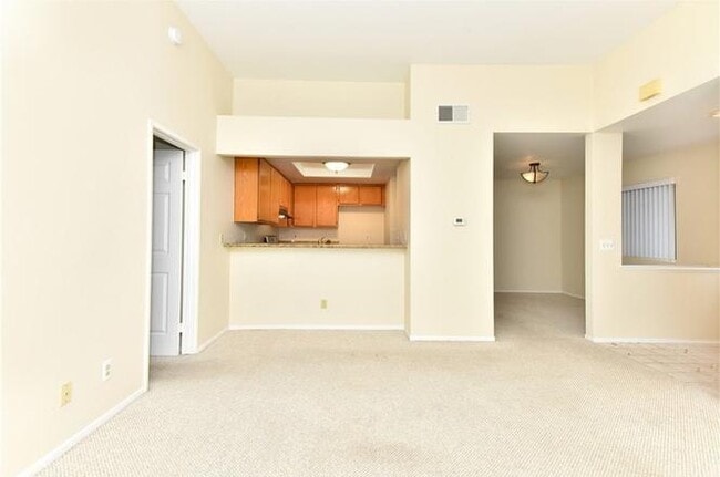 Building Photo - "Charming 1-Bedroom Condo in Anaheim – Ide...