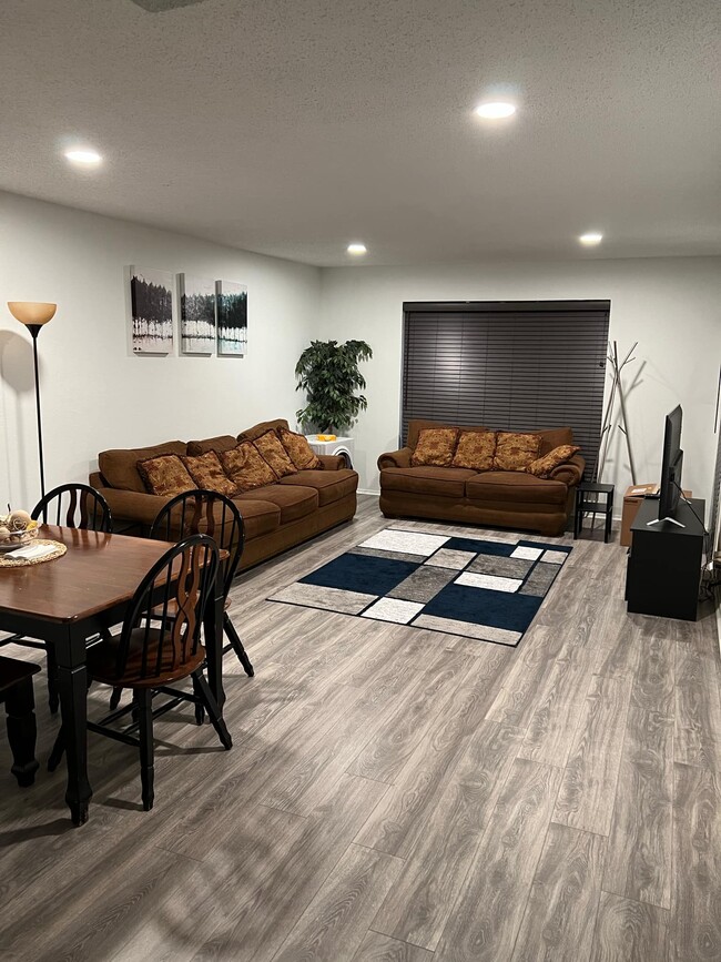 Living area (Couches and dining table) - 4837 Cedar Springs Rd